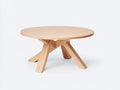 Table à manger ronde en bois 130×130×75 cm - bois naturel clair - piètement croisé sculptural